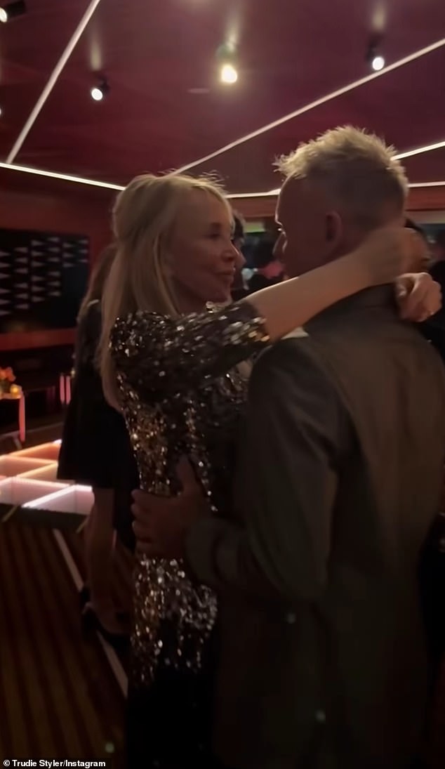 The couple, who have been married since 1992, shared a kiss on the dance floor as they partied the night away