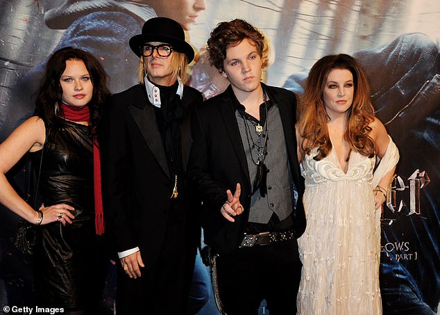 Michael Lockwood (CL), Ben Keough (CR) and Lisa Marie Presley (R) attend the world premiere of Harry Potter And The Deathly Hallows in London, on November 11, 2010