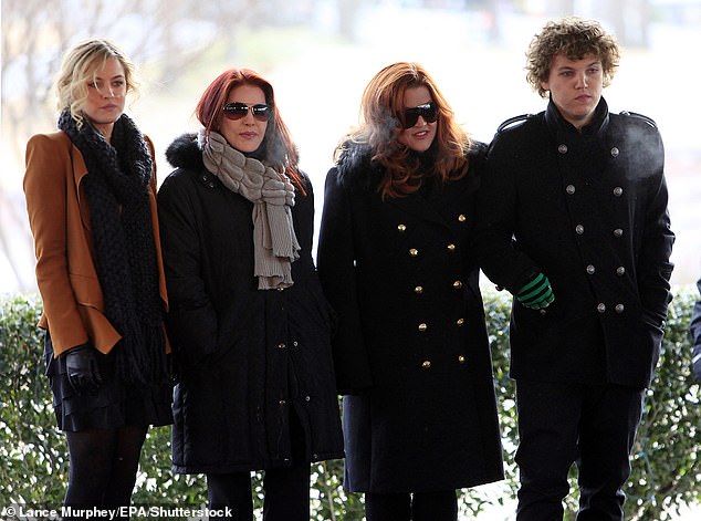 Riley Keough, Priscilla Presley Lisa Marie and Benjamin Keough pictured in front of the celebration of what would have been Elvis' 75th birthday near Graceland, January 8, 2010