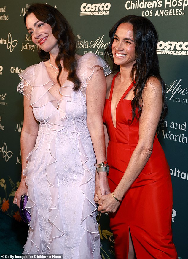 Meghan grabbed her friend Kelly McKee Zajfen's hand at the event, looking like a washed-up celebrity instead of the strong, principled woman Liz Jones has always admired.