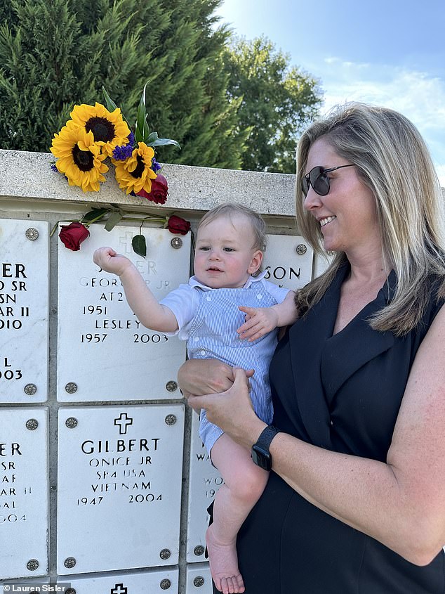 The award-winning journalist visits her parents' grave with her son Mason