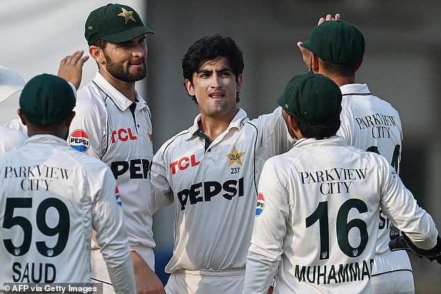 Naseem Shah celebrated with teammates after taking the England skipper's wicket