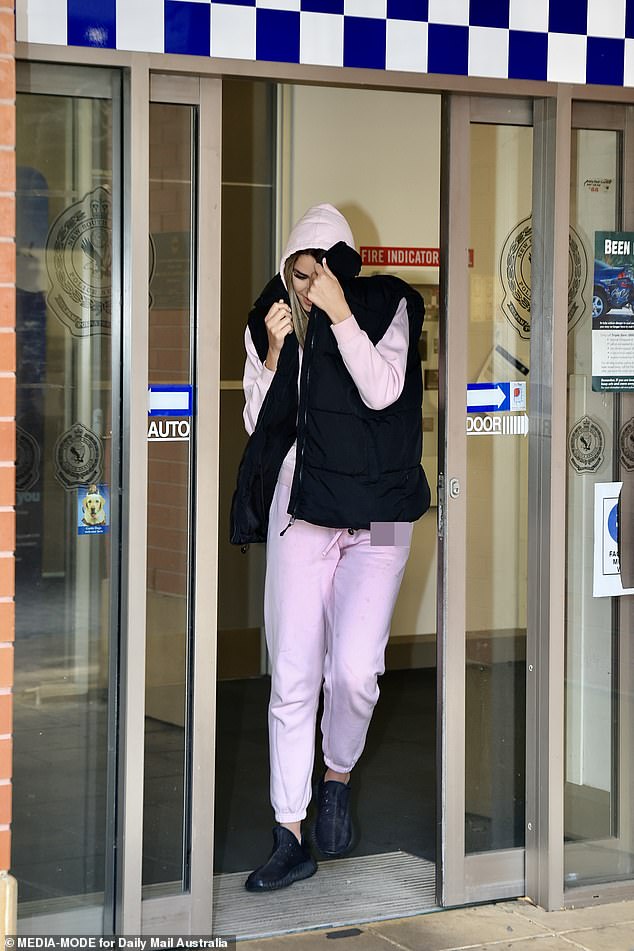 Sarah was seen leaving Kogarah police station in Sydney's southern suburbs last Wednesday afternoon, shielding her face with her jacket