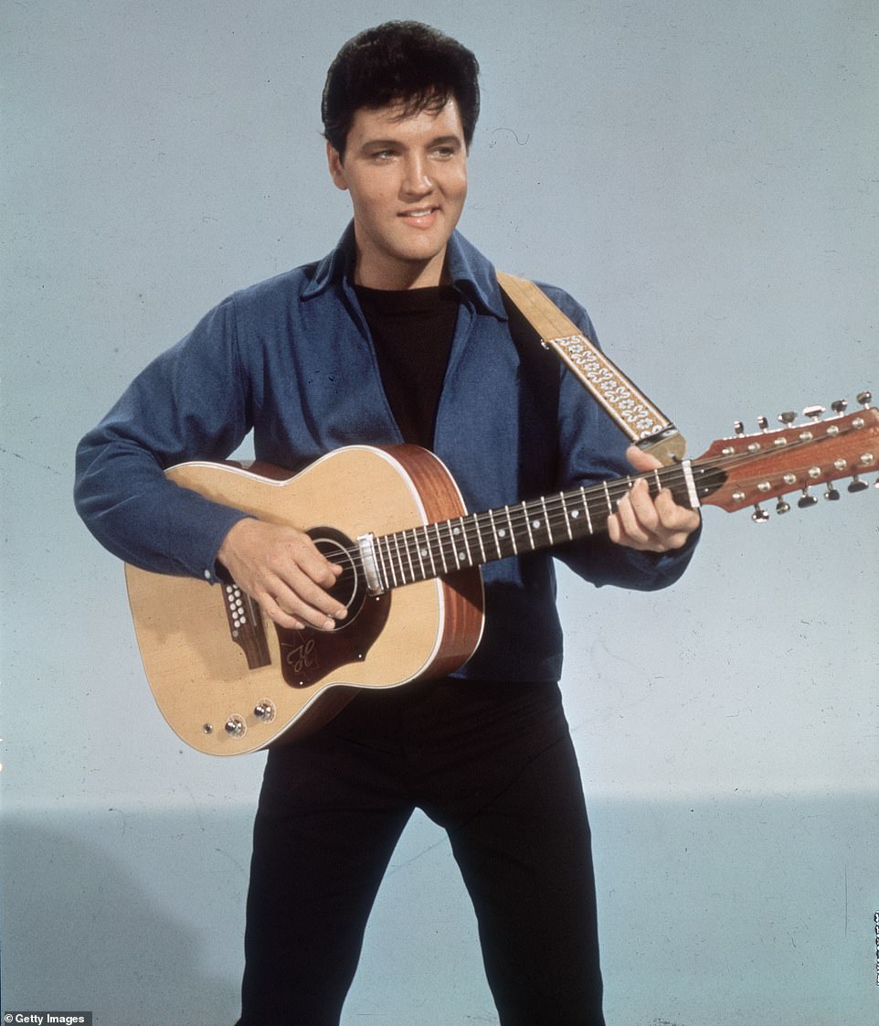 Elvis Presley with a twelve-string guitar in 1955