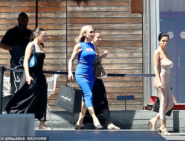 The Yeezus rapper was in Tokyo while Bianca was away in her native Australia to be with her family (pictured with her mother and sisters in LA in August)