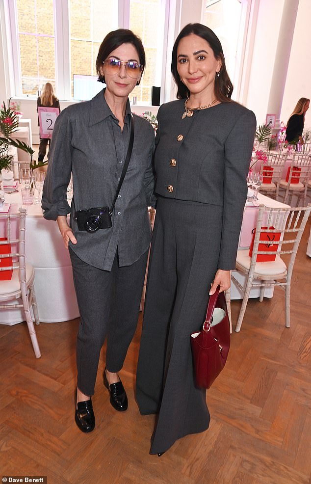 Lauren posed at the event with Paul McCartney's daughter Mary, 55, who also wore an all-grey outfit