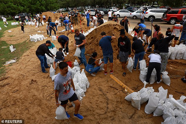 People prepare sandbags ahead of Hurricane Milton's arrival in Orlando