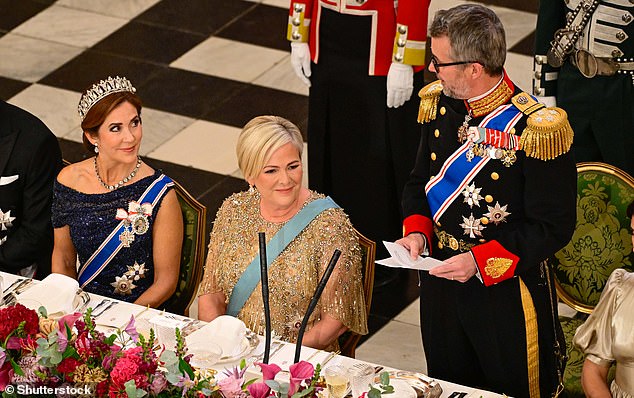 ROYAL COUPLE: Queen Mary (pictured, left) smiled at her husband King Frederick (pictured, right) as he gave a speech (President Halla Tomasdottir is in the center of the photo)