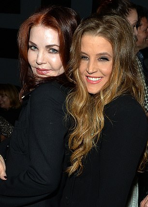 Priscilla Presley celebrates backstage with her daughter Lisa Marie Presley after Lisa Marie's performance at 3rd & Lindsley during the 14th Annual Americana Music Festival & Conference in 2013