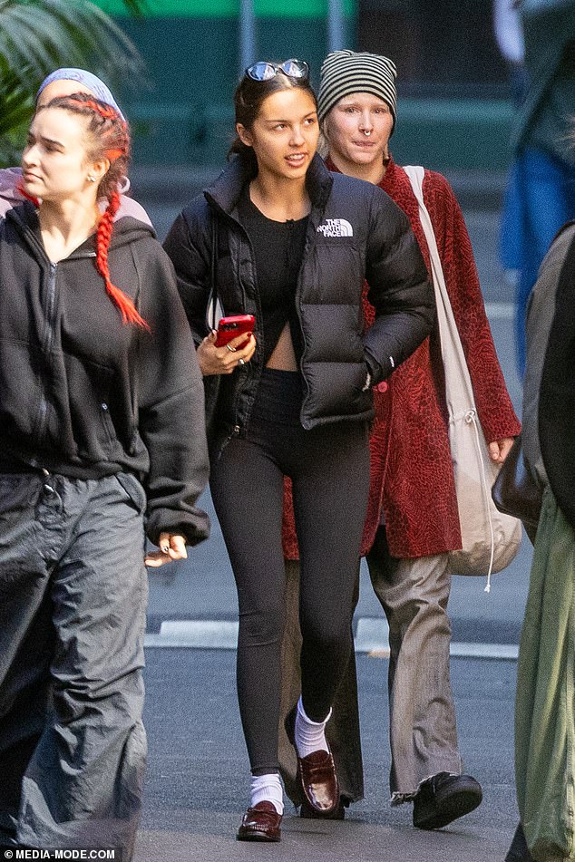 She added skin-tight leggings and white socks along with maroon patent loafers