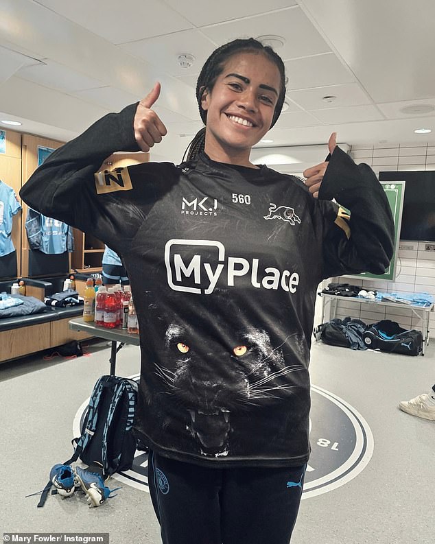 Fowler posted this photo of her wearing her boyfriend's jersey in the Manchester City dressing room shortly after Penrith's stunning win in the grand final