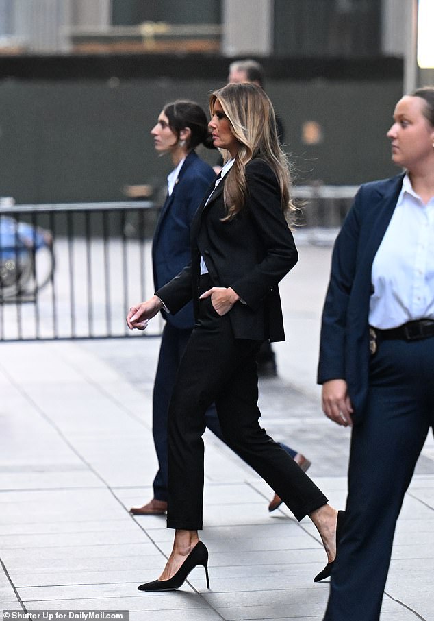 Former First Lady Melania Trump leaves Fox News headquarters in Manhattan after her interview on The Five while promoting her new memoir Melania. The former first lady was flanked by Secret Service agents as she walked to an SUV