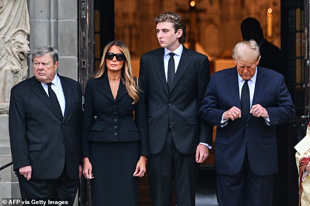 Melania Trump (center left) is photographed with her father Victor Knavs (left), son Barron (center right) and former President Donald Trump at her mother's funeral in January earlier this year