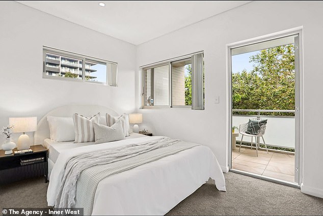 The two-storey townhouse has three bedrooms (one pictured), a study and two balconies