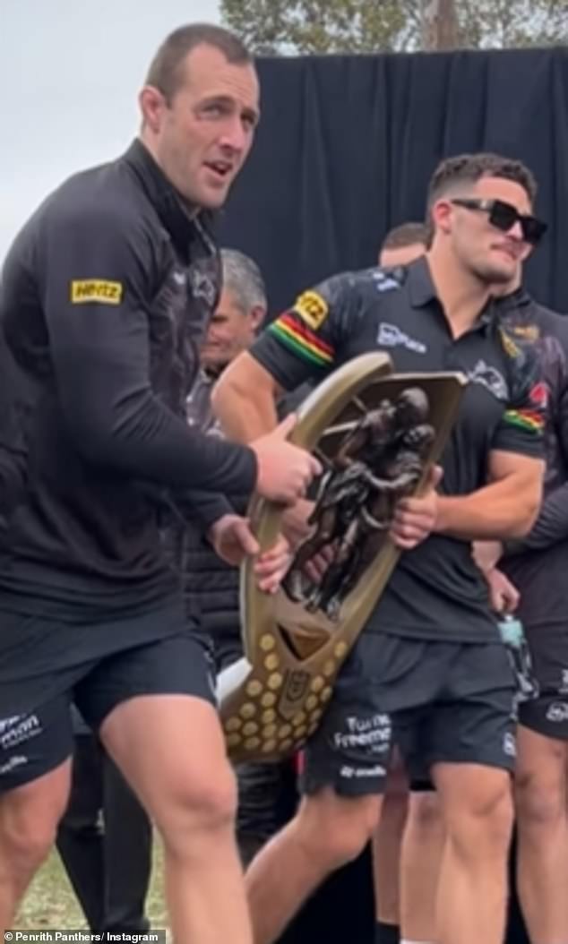 It comes after the halfback (right, with teammate Isaah Yeo) helped Penrith to a fourth consecutive NRL premiership at Accor Stadium on Sunday