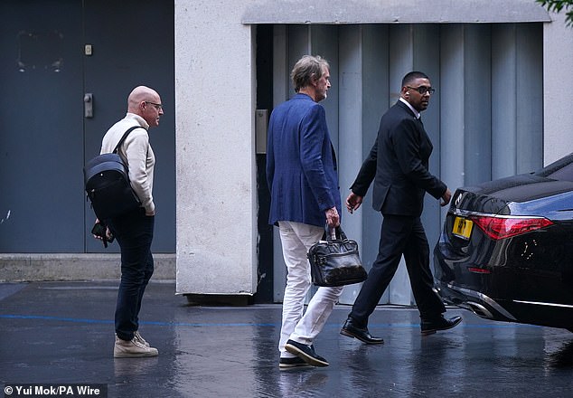 Ten Hag's future was discussed at a United summit led by Sir Jim Ratcliffe (center) in London