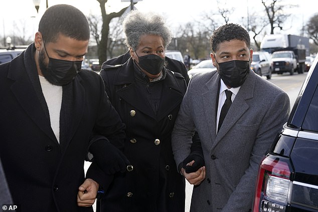 The 42-year-old Empire actor's mother, Janet, had her home targeted by two intruders — who tried to break open a back door and caused $300 in damage to a window, according to TMZ. Janet is pictured accompanying Smollett - straight-to court in 2021