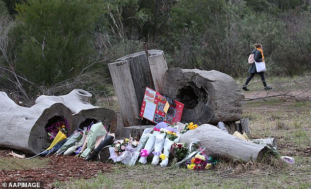 Tributes at the site where Courtney Herron was murdered in 2019