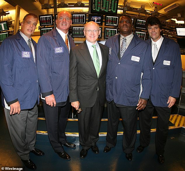 Joe Klecko, Marty Lyons, Abdul Salaam and Mark Gastineau, collectively known as the famous New York Jets "Bag swap" working on the floor of the American Stock Exchange after the opening bell to help kick off the upcoming National Football League season on August 29, 2007