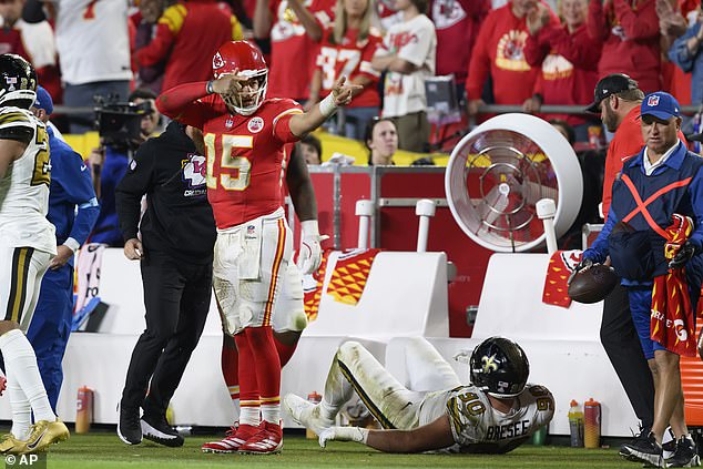 Kansas City Chiefs quarterback Patrick Mahomes (15) signals a first loss on Monday