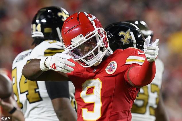 Kansas City Chiefs wide receiver JuJu Smith-Schuster signals a first down on Monday