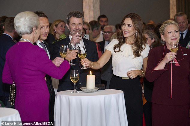 Mary was effortlessly elegant in her outfit and styled her brunette locks in glamorous waves for the event