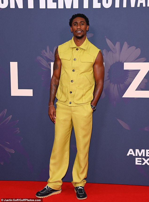 Elsewhere, CJ Beckford dressed cool in a yellow sleeveless cargo jacket that he paired with matching trousers