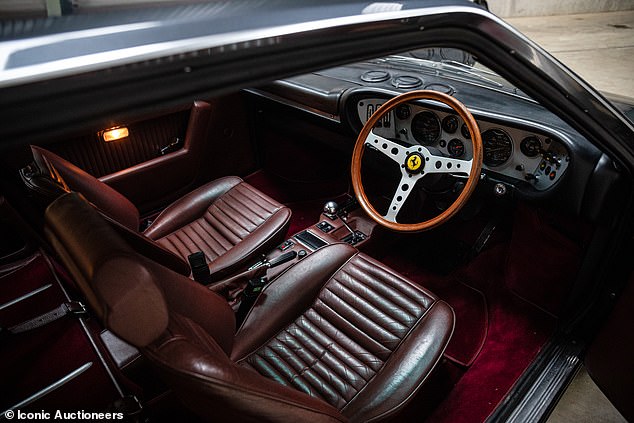 It is unusually one of the very rare cars with 'factory' rear seat 'delete' (where the rear seat is removed for space or performance reasons) - the interior is finished in beautiful burgundy