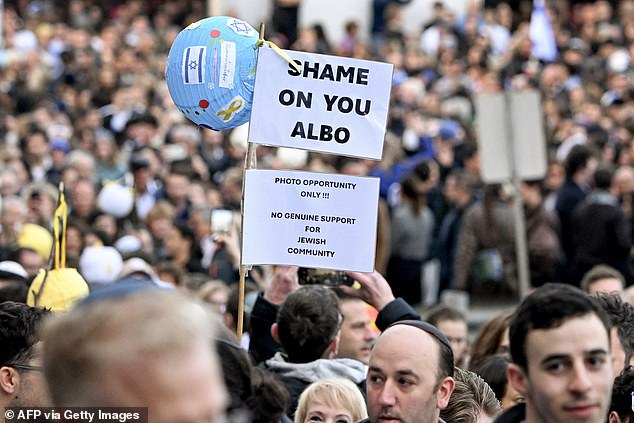 Some people held signs reading 