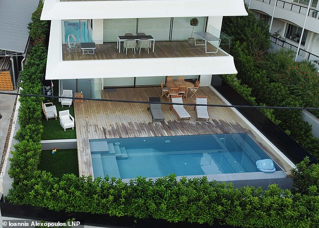 The scene where former Sheffield United defender George Baldock was found dead in his swimming pool in Athens, Greece