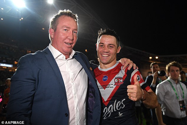 The three-time premiership coach (pictured left with Cooper Cronk after the 2019 NRL grand final) spent two nights in hospital