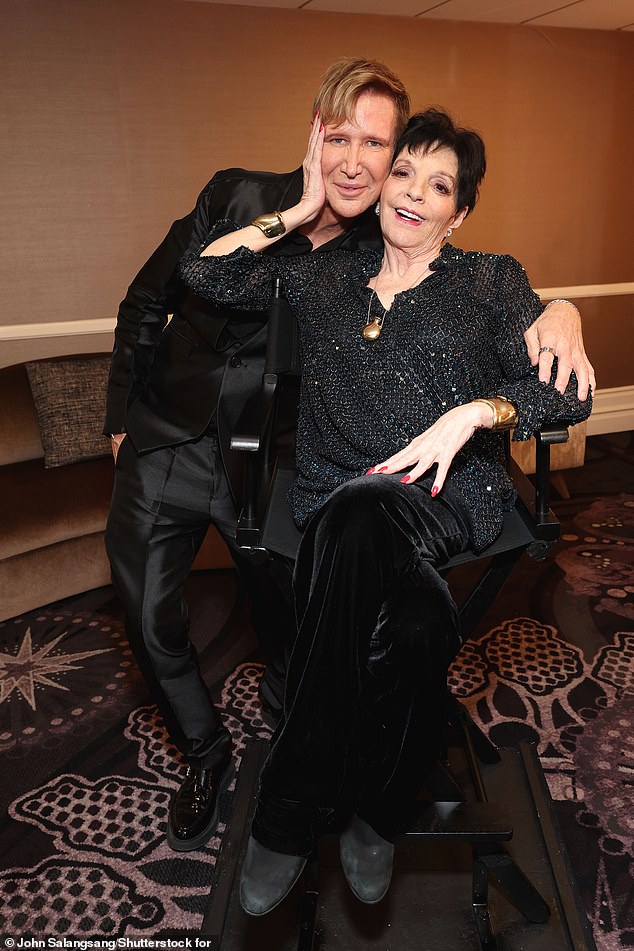 However, her health seemed much improved as she dressed to impress on the evening, with the Cabaret star donning a sparkling black shirt, teamed with black velvet trousers and black ankle boots. [pictured with Lawrence D. Piro]