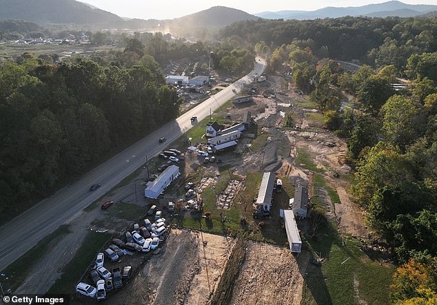 An aerial view of flood-damaged homes in the aftermath of Hurricane Helene on October 4 in Swannanoa, North Carolina. At least 215 people were killed in six states