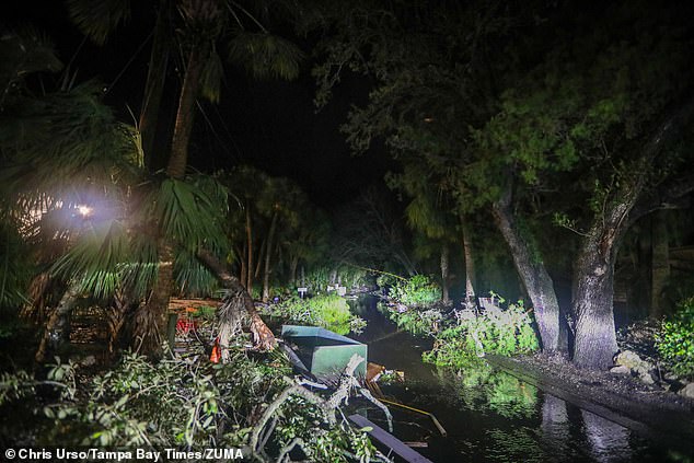 Debris along Commonwealth Drive, Siesta Key clogs the roadway Thursday after Hurricane Milton made landfall overnight