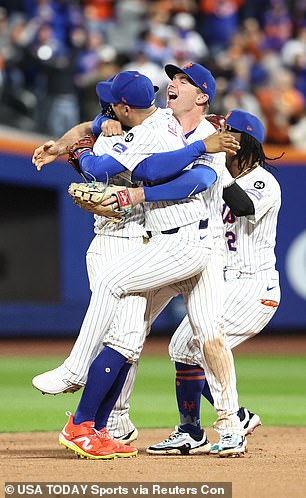 New York Mets players celebrate the decisive victory over the rival Phillies on Wednesday