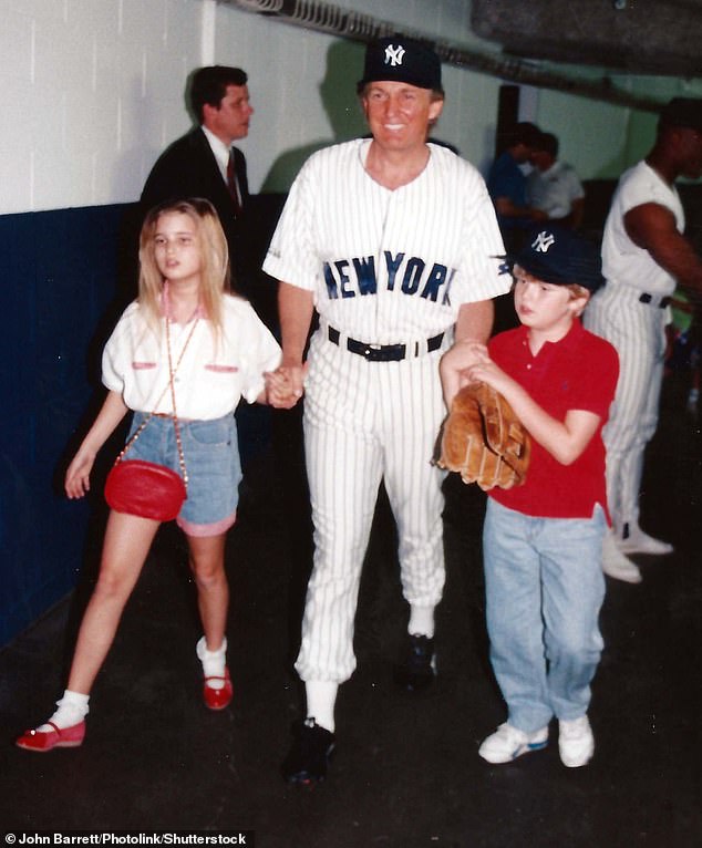 Donald Trump is pictured at the old Yankee Stadium with his daughter Ivanka and son Eric