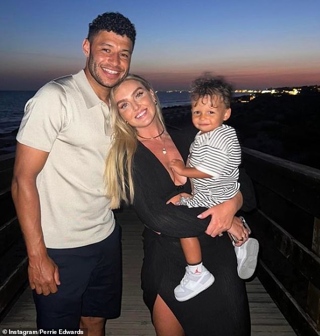 Perrie told the BBC show's presenters that she is finding it challenging to juggle so many responsibilities and that she feels 'mum guilty' as she launches her solo career (pictured with her partner Alex Oxlade-Chamberlain and their son)