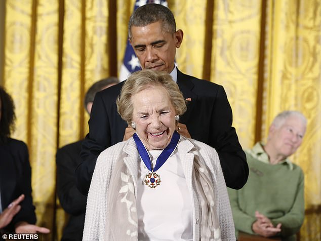 Kennedy receives the Presidential Medal of Freedom from President Obama on November 24, 2014