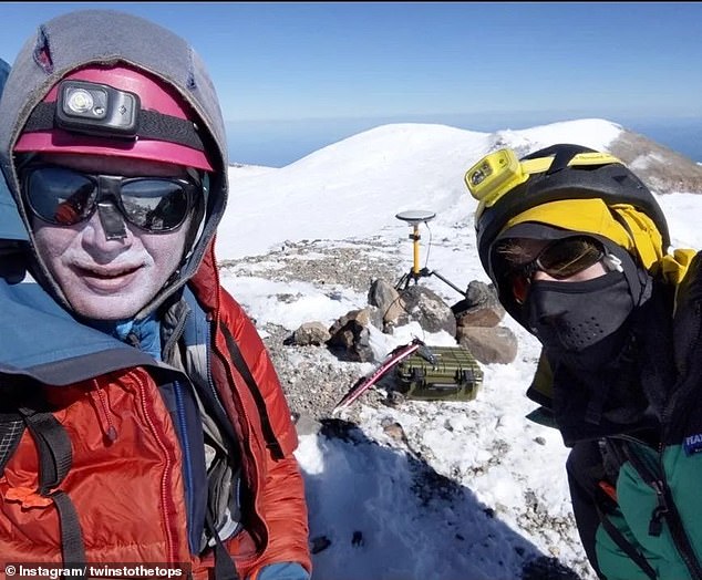 Eric Gilbertson (left) hiked Mount Rainier in August and September and used a GPS survey unit to determine the mountain's height