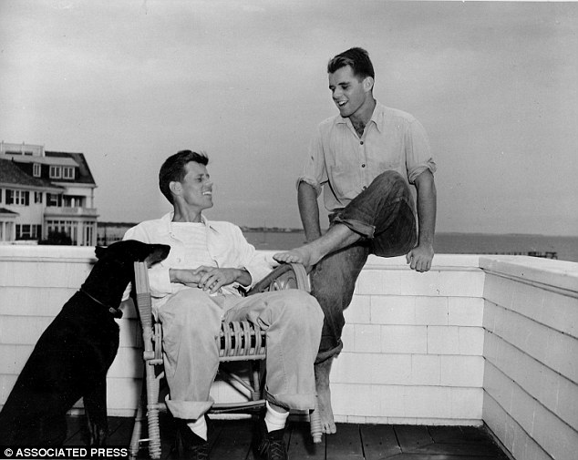 John F. Kennedy with his brother, Robert Kennedy, and his dog, Mo, in Hyannis Port, Massachusetts in 1946. They were so close that RFK fell apart when his brother was assassinated