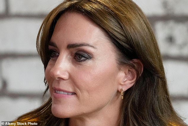 Kate made good on the promise to wear them when she was in Birmingham to mark World Mental Health Day later that year