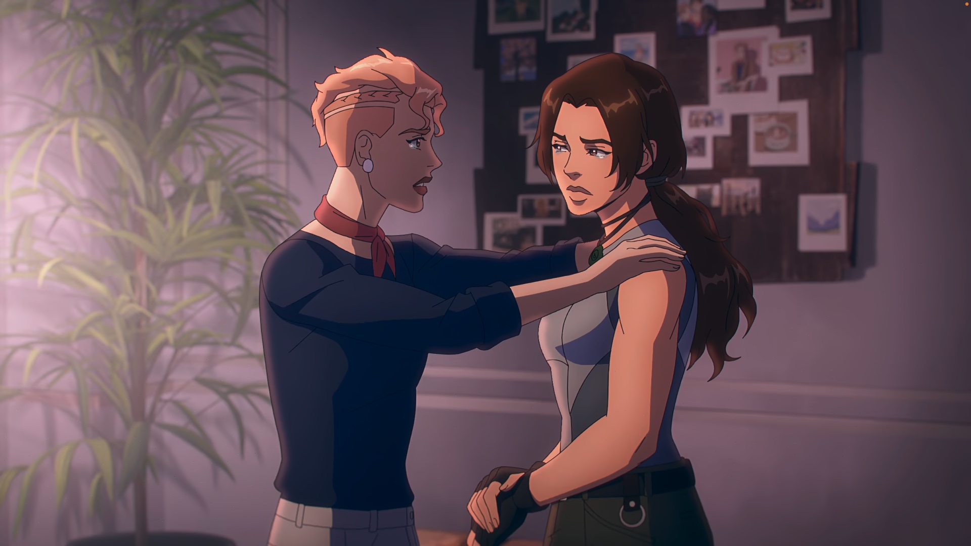 Camilla comforts a crying Lara Croft in her apartment in Tomb Raider: The Legend of Lara Croft