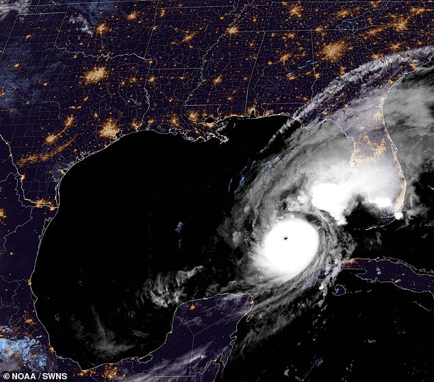 Above, a NOAA satellite image of Hurricane Milton taken at 3:51 a.m. ET Wednesday - just a few hours after Dodge's ashes were scattered in the storm at 11 p.m. ET