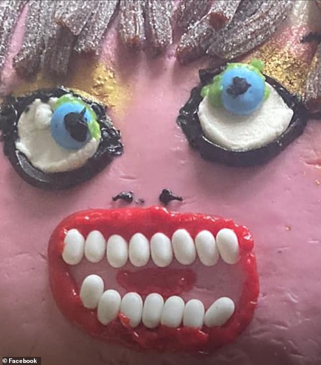 The eyes were uneven, both looking in different directions, while the bright red mouth was wide open; Keith used what looked like white Tic Tacs on the teeth