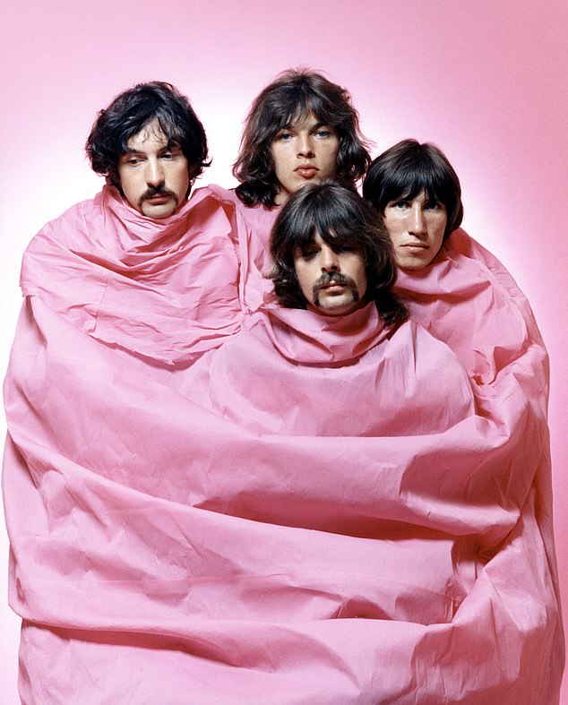 Psychedelic rock group Pink Floyd poses for a pink-clad portrait in August 1968 in Los Angeles. (L-R) Nick Mason, Dave Gilmour, Rick Wright (front centre), Roger Waters.