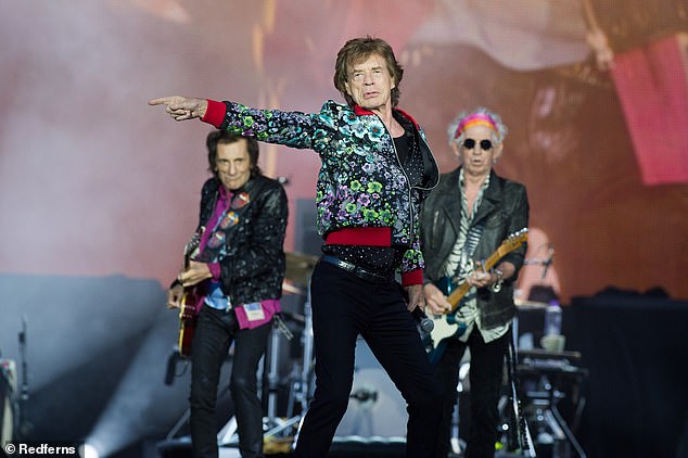 Mick Jagger, Keith Richards and Ronnie Wood of The Rolling Stones perform at Hippodrome de Longchamp on July 23, 2022 in Paris, France