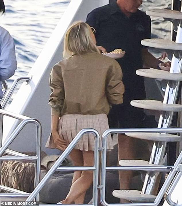 Jackie pulled out all the stops and cut a very stylish figure for the boat party