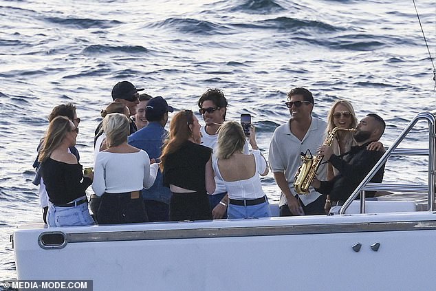 They all seemed to be having a great time as they cruised Sydney Harbor and partied to music before docking to listen to Rüfüs Du Sol's sunset concert.