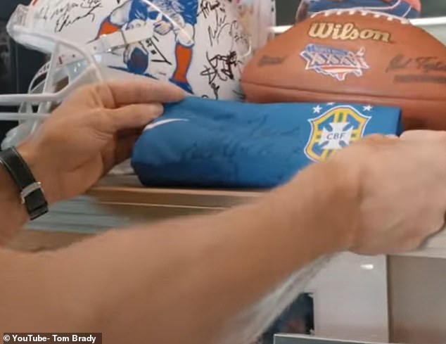 Brady also held up a Brazil jersey signed by the late, great Pele, who passed away in 2022