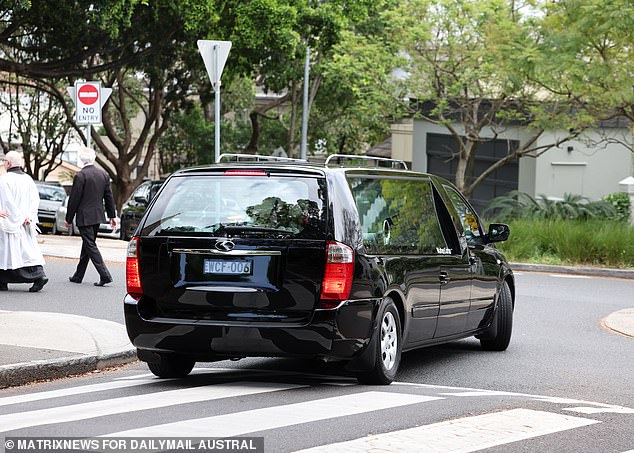 Savana Calvo's coffin is driven out of St. Mark's Church after the funeral service